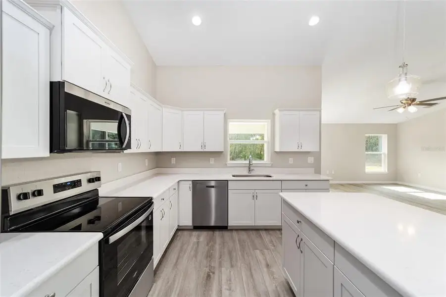 Furnished interior view inside a new home in , Dunnellon (Image 7).