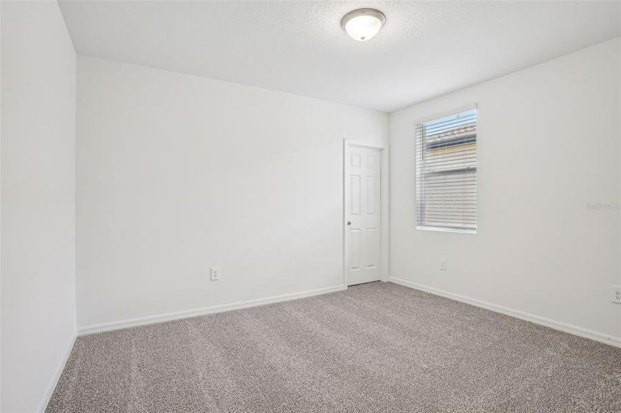 Spacious, unfurnished interior of a new home in Lake Deer Estates - Signature Series, Poinciana (Image 18). Spacious, unfurnished interior of a new home in Lake Deer Estates - Signature Series, Poinciana (Image 18).