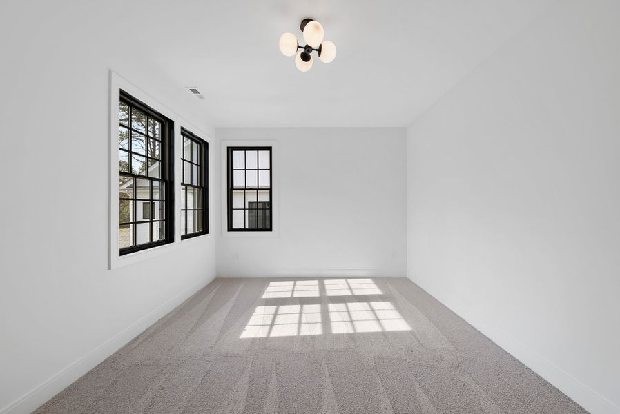 Representative unfurnished interior of a home built from the Grace by Homes by Dickerson in The Founding at Blue Ridge, Raleigh (Image 32).