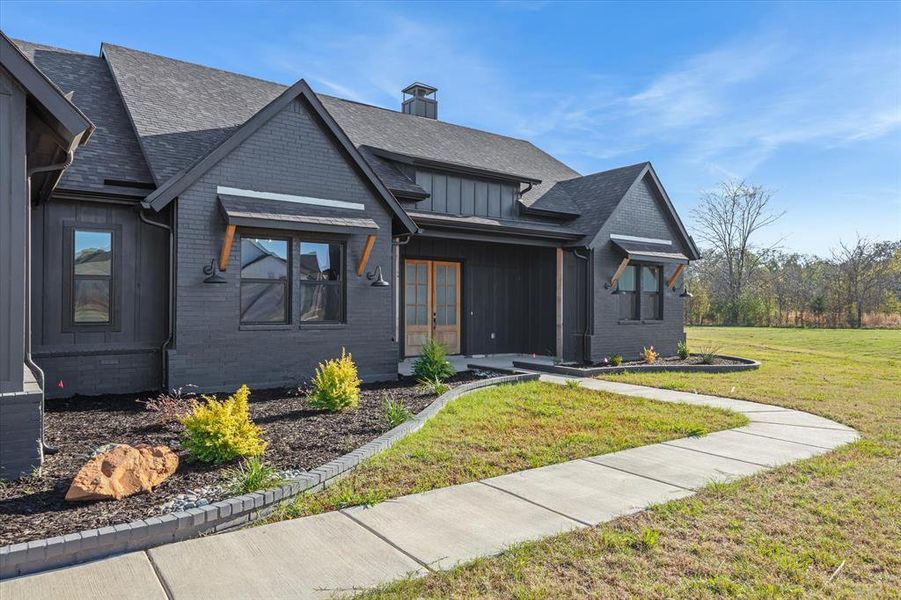 Front exterior of a new home in , Canton, TX, highlighting curb appeal (Image 24). Front exterior of a new home in , Canton, TX, highlighting curb appeal (Image 24).