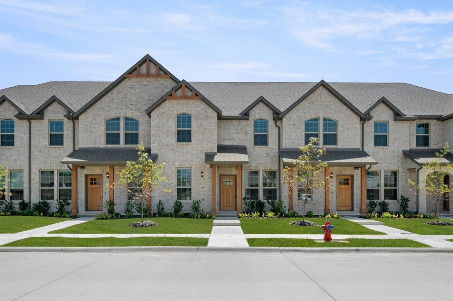 Front exterior of a new home in Sanger Circle – Townhomes, Sanger, TX, highlighting curb appeal (Image 1). Front exterior of a new home in Sanger Circle – Townhomes, Sanger, TX, highlighting curb appeal (Image 1).