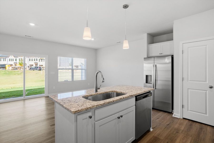 Furnished interior view inside a new home in West Main Townhomes, Sanford (Image 8).