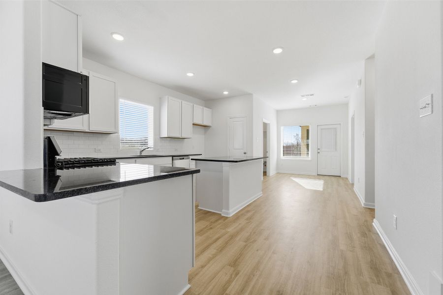 Furnished interior view inside a new home in La Terra, Celina (Image 9).