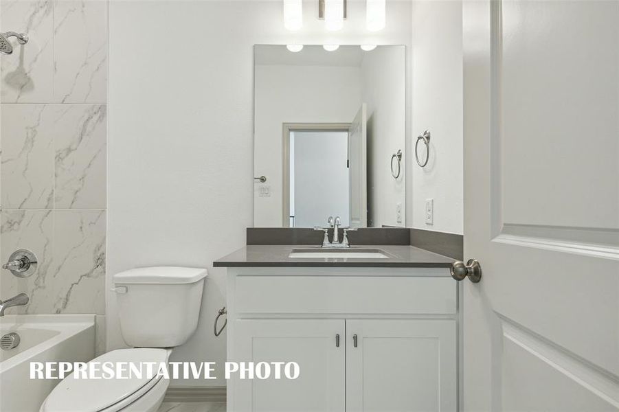 Friends and family will feel right at home in this lovely guest bath.  REPRESENTATIVE PHOTO