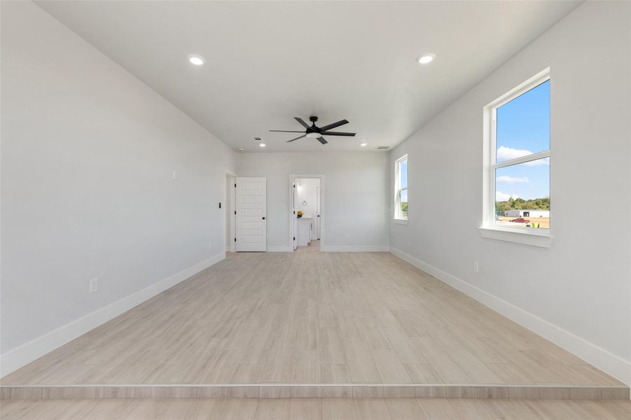Spacious, unfurnished interior of a new home in , McDade (Image 19).