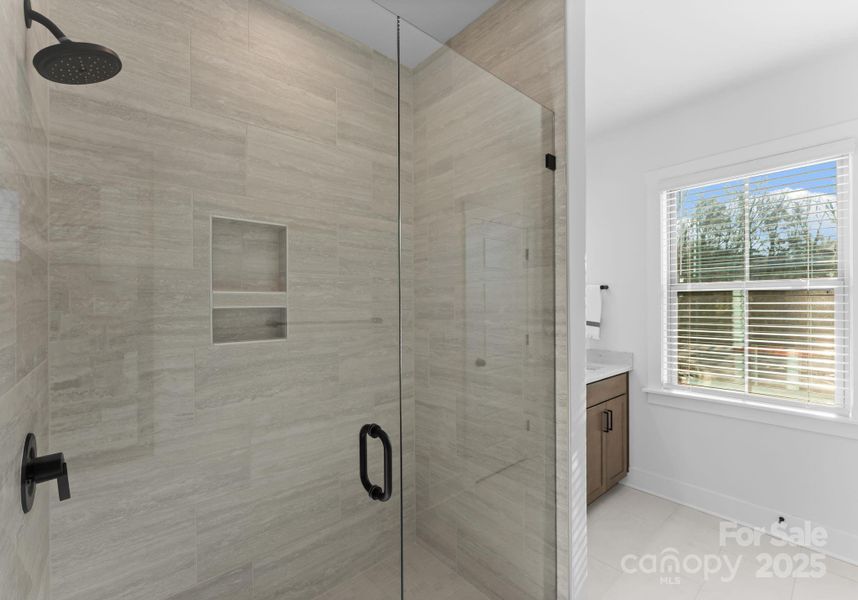 Photo is of model home in community, finishes may vary