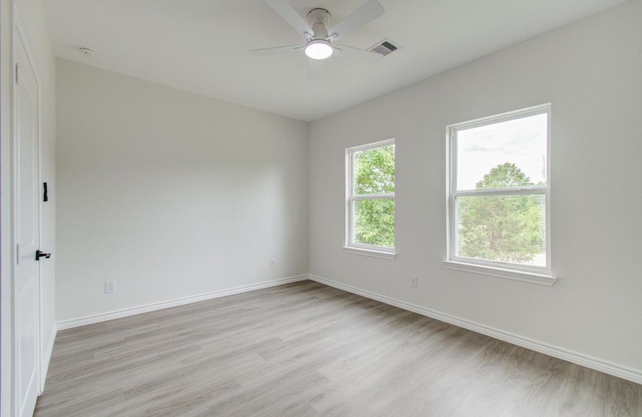 Virtual staging of one of the bedrooms upstairs. Virtual staging of one of the bedrooms upstairs.