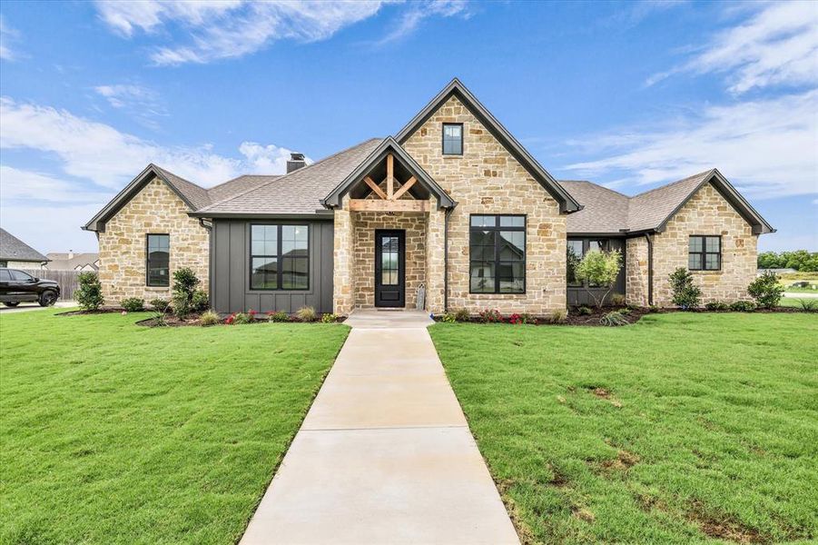 Front exterior of a new home in , Robinson, TX, highlighting curb appeal (Image 27). Front exterior of a new home in , Robinson, TX, highlighting curb appeal (Image 27).
