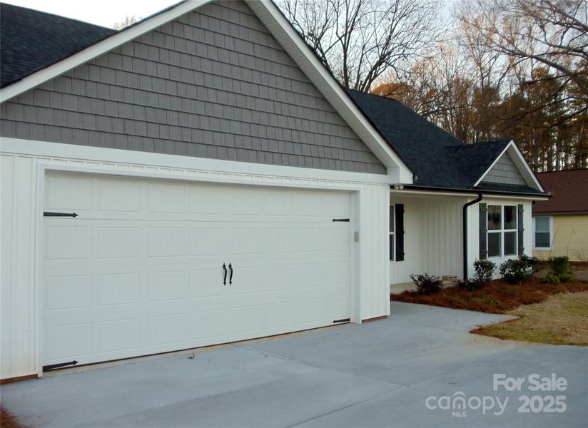 Exterior details and patio area of a home in , Mooresville (Image 25).