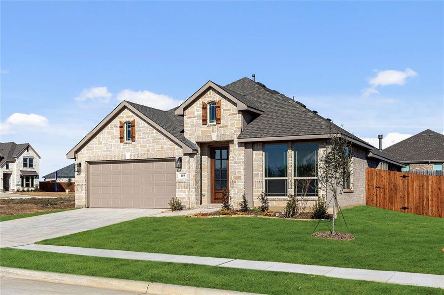 Front exterior of a new home in Sable Creek, Sanger, TX, highlighting curb appeal (Image 2).
