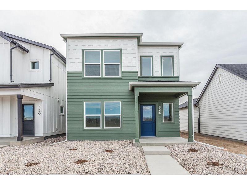 Exterior details and patio area of a home in Bloom Trailblazer Collection - Single Family Homes, Fort Collins (Image 25).