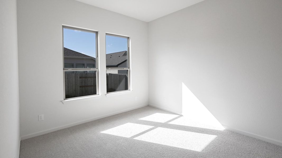Unfurnished room featuring carpet flooring
