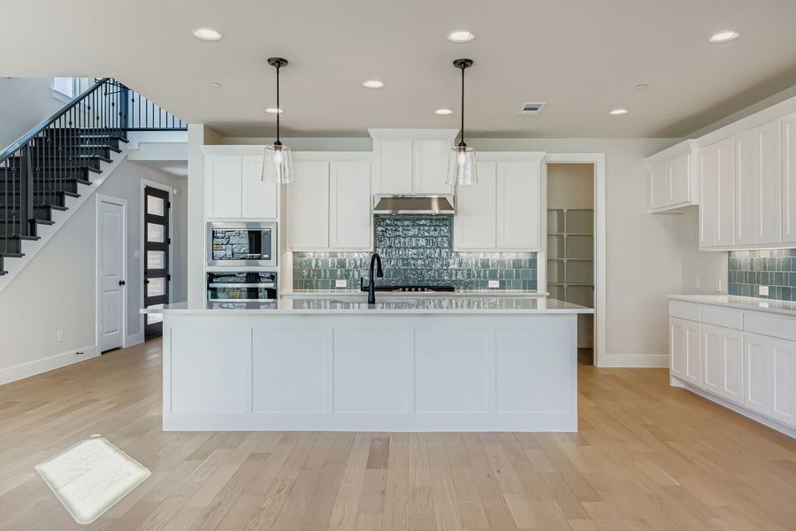 Furnished interior view inside a new home in Castle Hills Northpointe - Townhomes, Lewisville (Image 11).
