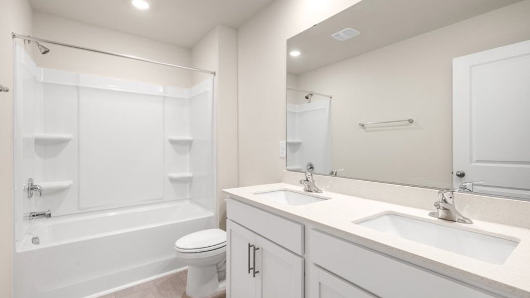 Furnished interior view inside a new home in Villa Grande, Winterville (Image 9).