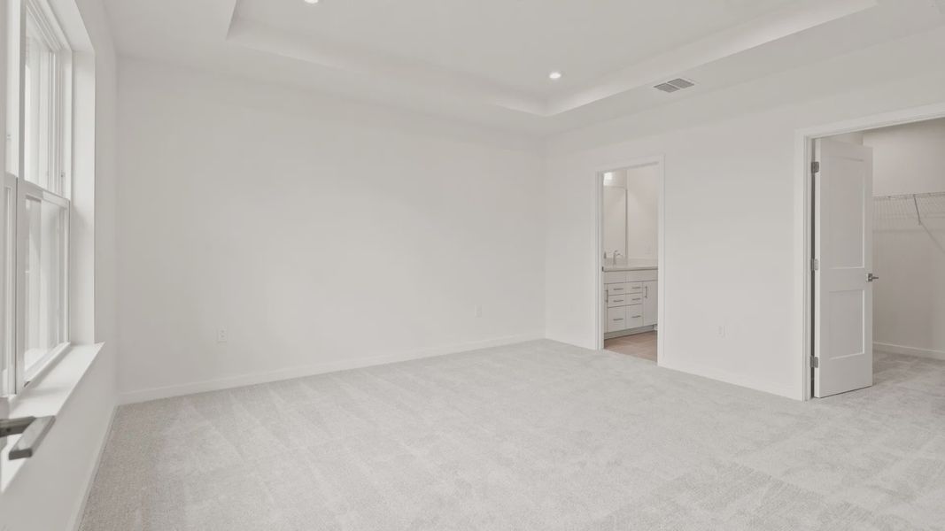 Furnished interior view inside a new home in Grasslands West, Lakeland (Image 14).