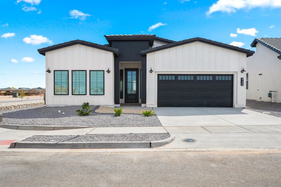 Front exterior of a new home in Painted Sky, El Paso, TX, highlighting curb appeal (Image 24).