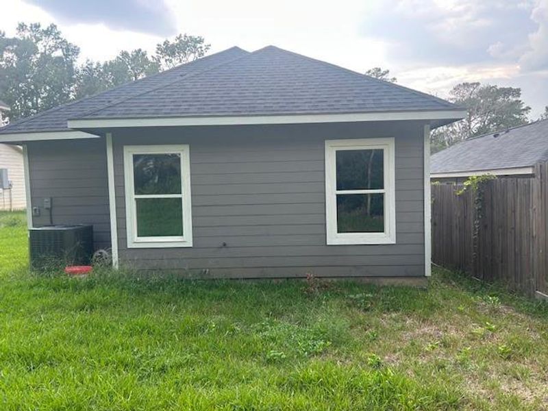 Exterior details and patio area of a home in Frontier Lakes, Willis (Image 20). Exterior details and patio area of a home in Frontier Lakes, Willis (Image 20).