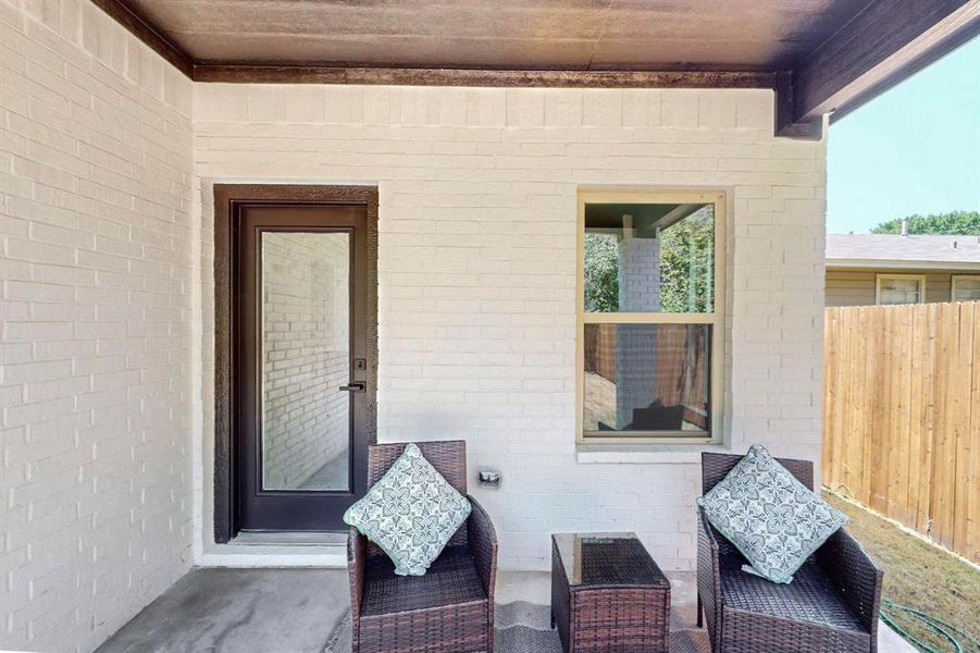 Back patio featuring an outdoor living space