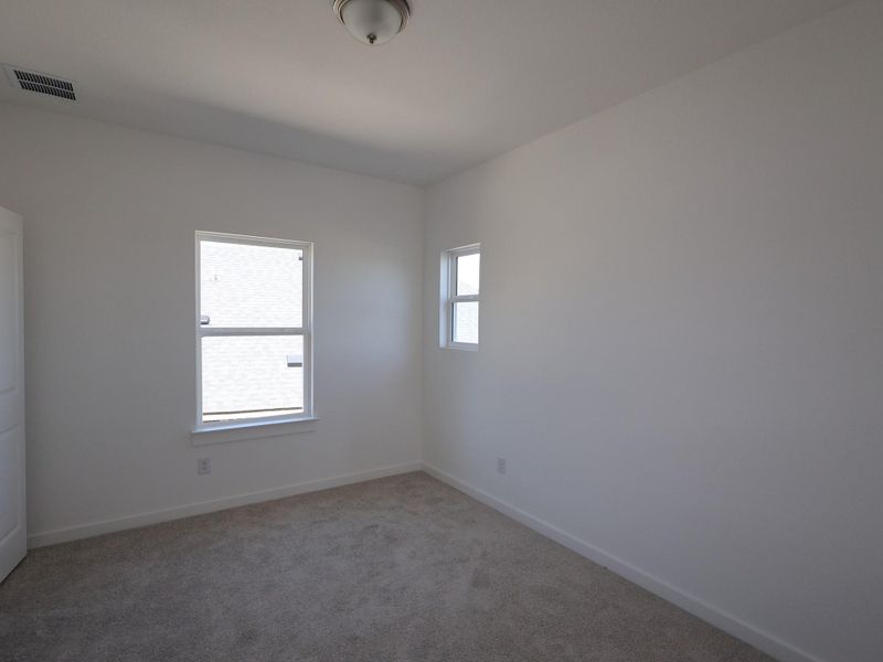 Spacious, unfurnished interior of a new home in Heritage, Dripping Springs (Image 10). Spacious, unfurnished interior of a new home in Heritage, Dripping Springs (Image 10).