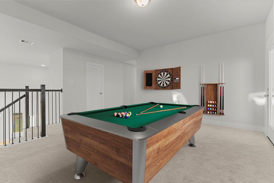 Another view of the game room showcases the airy layout and bright natural light streaming through the windows, creating a comfortable space to relax, play, or gather with family. *Staged Photo* Another view of the game room showcases the airy layout and bright natural light streaming through the windows, creating a comfortable space to relax, play, or gather with family. *Staged Photo*