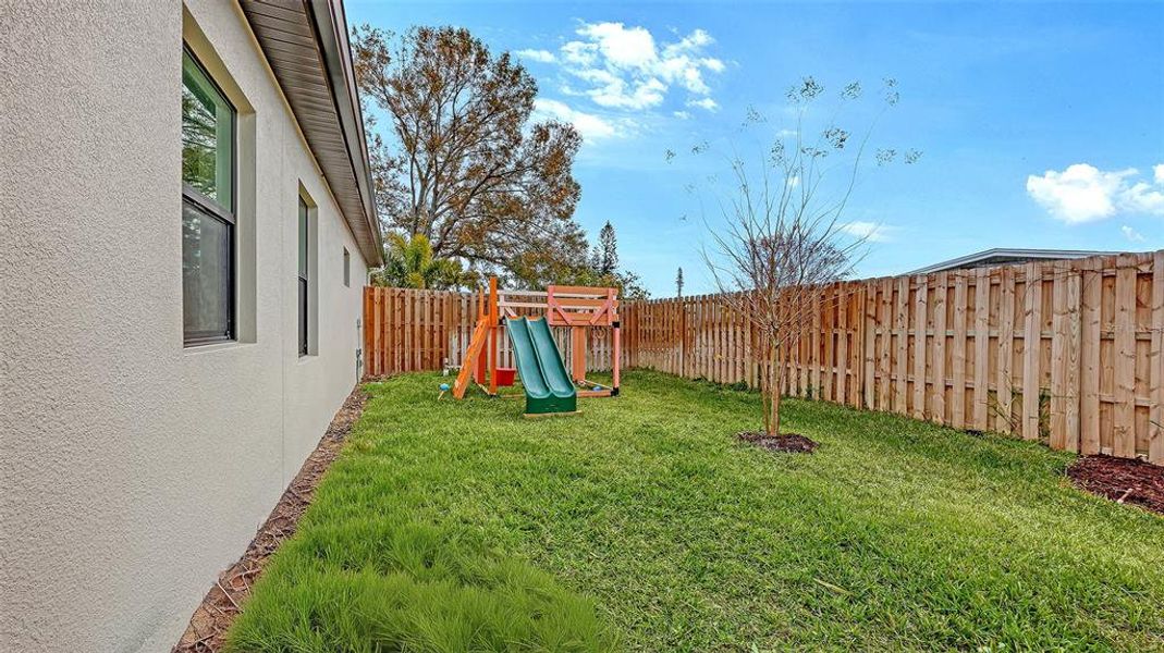 Exterior details and patio area of a home in , Sarasota (Image 24).