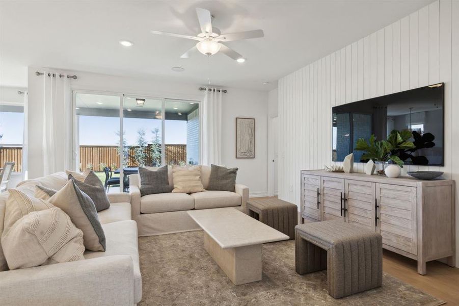 *Model Representation - Spacious gathering room with large windows