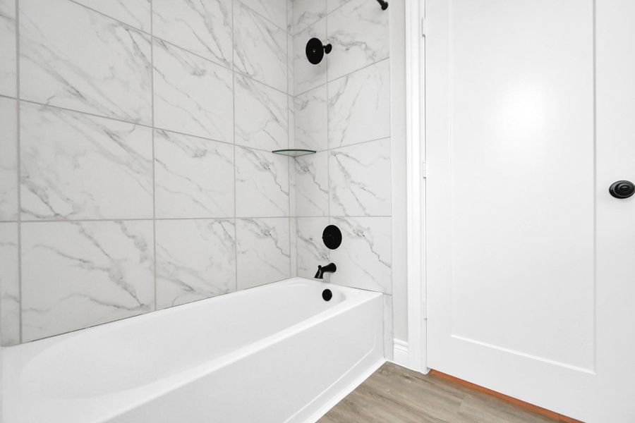 A second bathroom, conveniently located near the bedrooms, features modern fixtures and a stylish design. It caters to both functionality and aesthetics, ensuring a pleasant experience for all. A second bathroom, conveniently located near the bedrooms, features modern fixtures and a stylish design. It caters to both functionality and aesthetics, ensuring a pleasant experience for all.