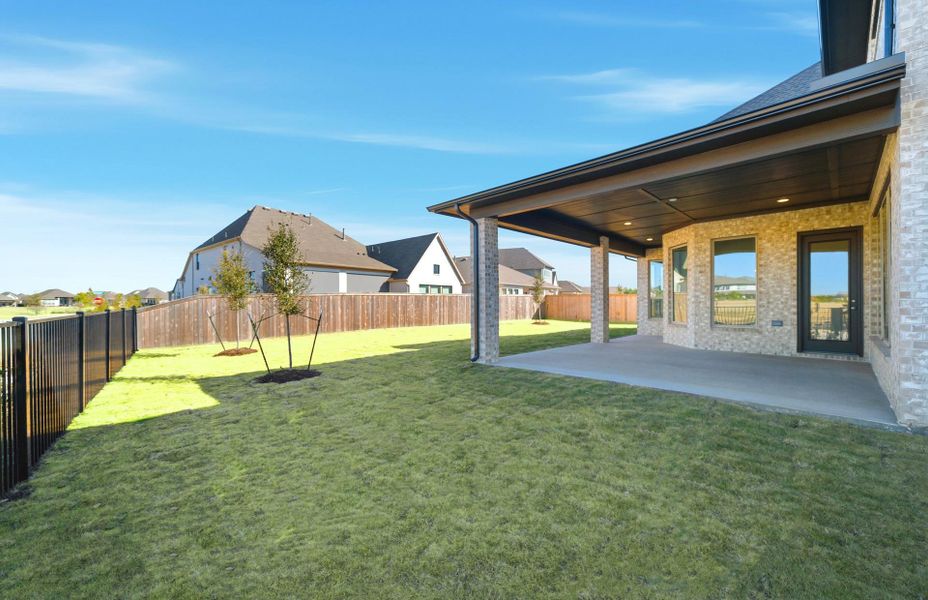 Exterior details and patio area of a home in Bridgeland 60′, Cypress (Image 3).