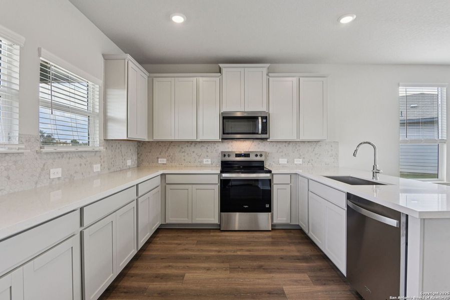 Furnished interior view inside a new home in Estancia Ranch - Premier Series, San Antonio (Image 14). Furnished interior view inside a new home in Estancia Ranch - Premier Series, San Antonio (Image 14).