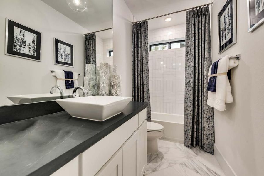 Furnished interior view inside a new home in Lakes at Legacy, Prosper (Image 18). Furnished interior view inside a new home in Lakes at Legacy, Prosper (Image 18).