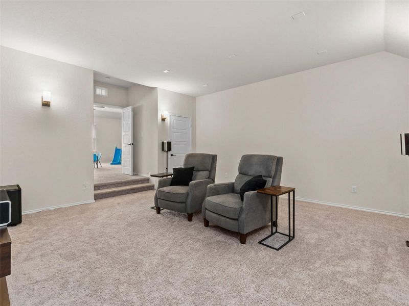 Living area with light carpet