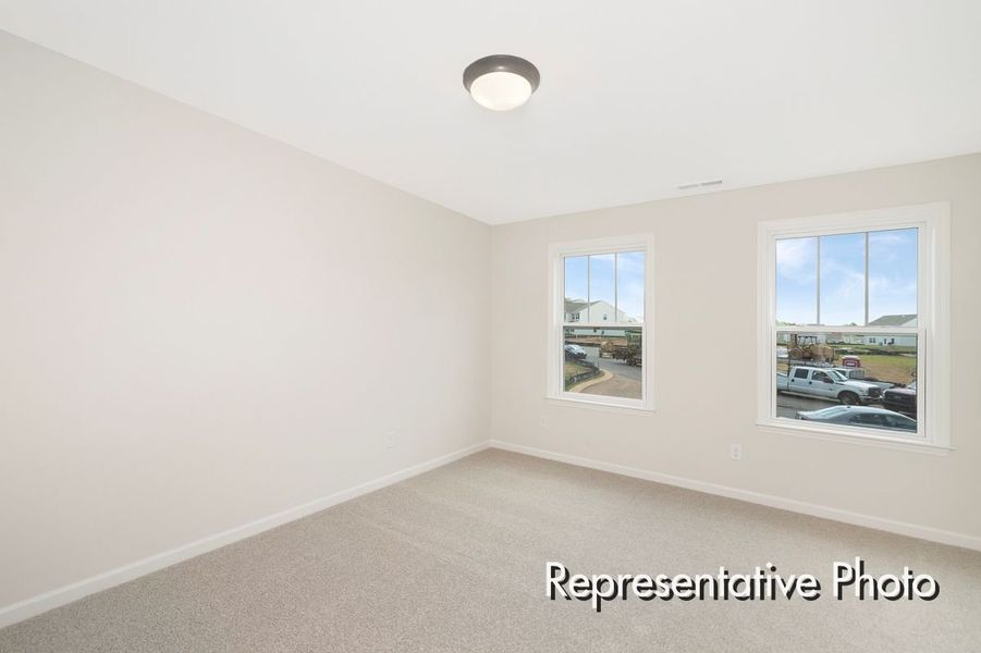 Spacious, unfurnished interior of a new home in Lake Royale, Louisburg (Image 17).