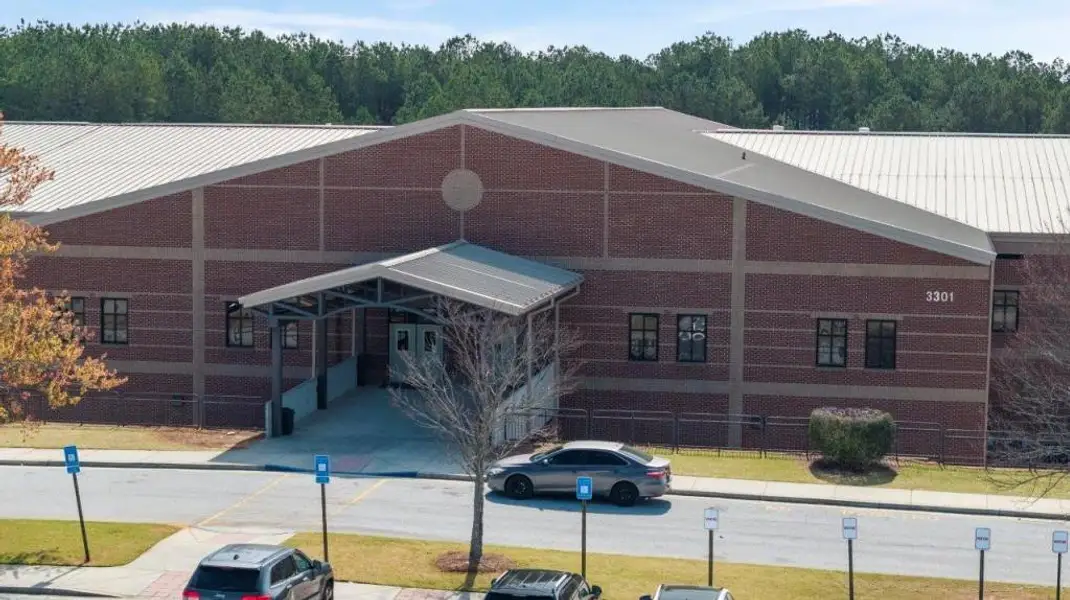 Front exterior of a new home in Fairhaven, Lithia Springs, GA, highlighting curb appeal (Image 2). Front exterior of a new home in Fairhaven, Lithia Springs, GA, highlighting curb appeal (Image 2).