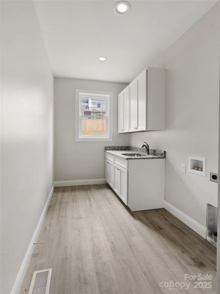 Laundry 15'6" x 5'11"