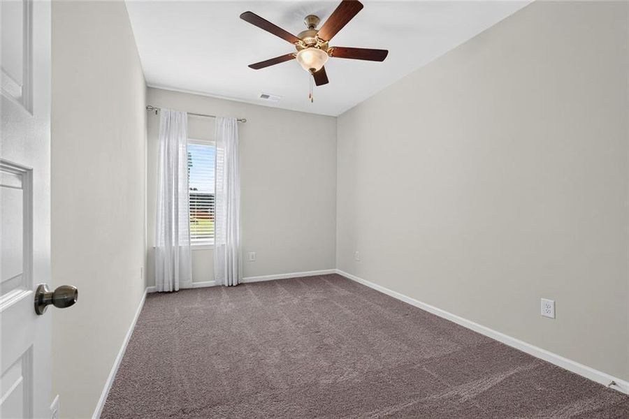 Spacious, unfurnished interior of a new home in Fuller Station, Loganville (Image 24).