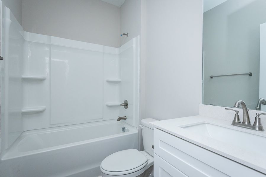 Representative furnished interior of a home built from the Adams by Foundation Home Builders LLC in Pallini Place, Ossipee (Image 7).