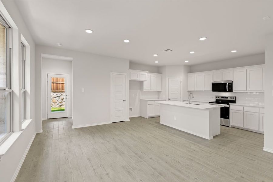 Representative exterior photo of a completed home built from the Mesquite by Impression Homes in Bryant Farms, Melissa, TX (Image 12). Representative exterior photo of a completed home built from the Mesquite by Impression Homes in Bryant Farms, Melissa, TX (Image 12).