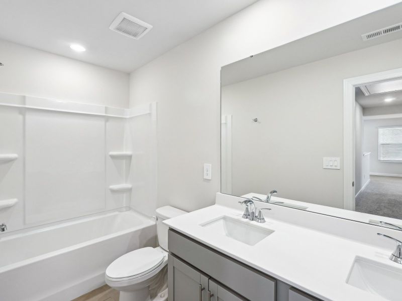 Furnished interior view inside a new home in Harper Landing, Stanley (Image 8).