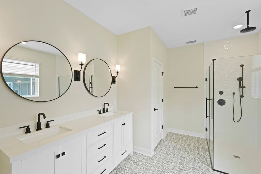 Primary bath with matte black finishes