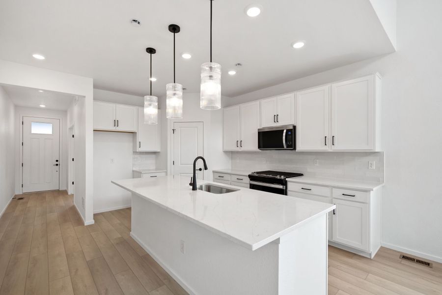 Furnished interior view inside a new home in Harvest Crossing, Aurora (Image 7).