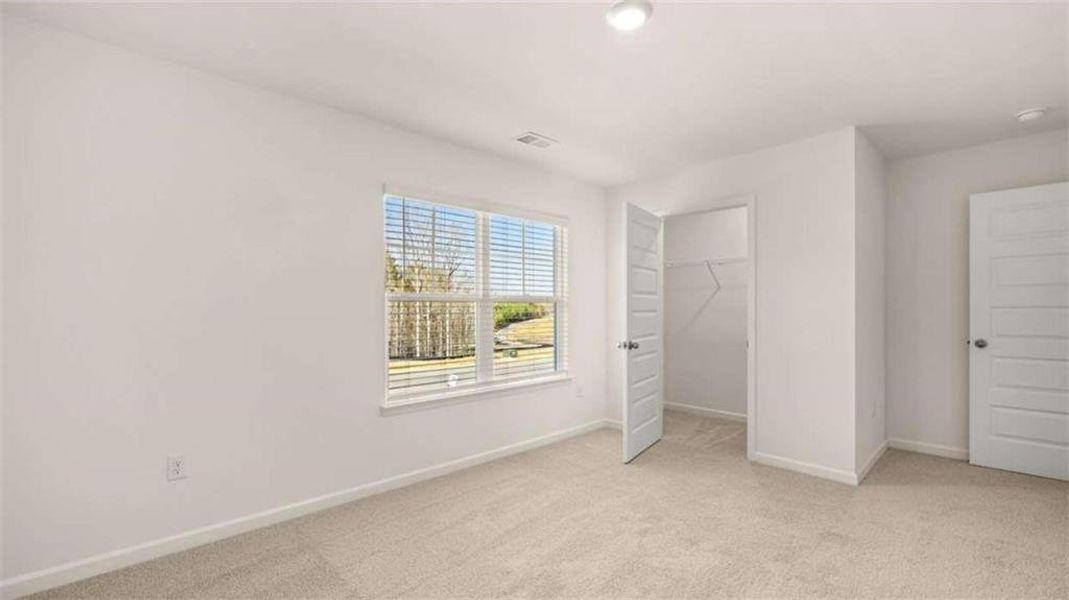 Spacious, unfurnished interior of a new home in Brooks Station, Dacula (Image 37).