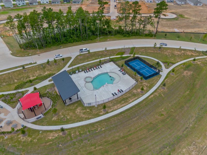 Enjoy resort-style living with features including a sparkling pool, tennis courts, scenic walking trails, and beautifully landscaped parks. Enjoy resort-style living with features including a sparkling pool, tennis courts, scenic walking trails, and beautifully landscaped parks.
