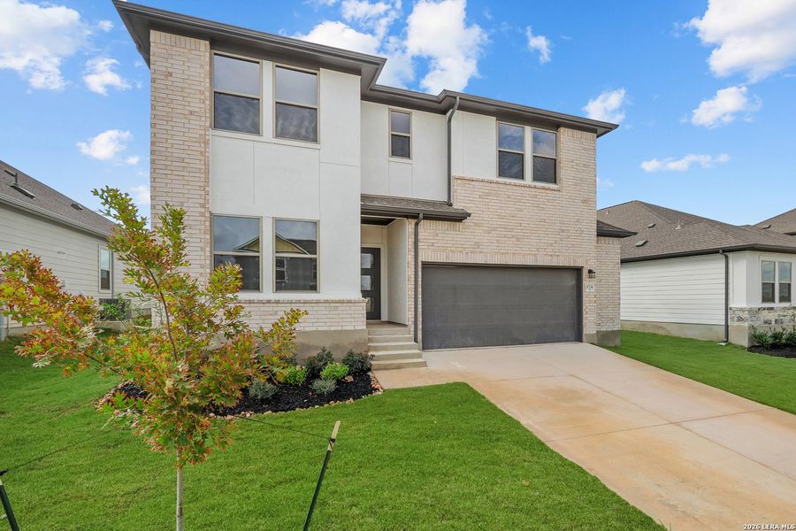 Front exterior of a new home in Garden Grove, San Antonio, TX, highlighting curb appeal (Image 23). Front exterior of a new home in Garden Grove, San Antonio, TX, highlighting curb appeal (Image 23).