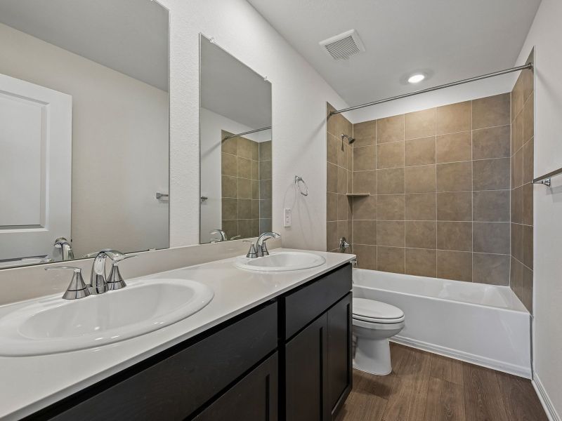 Furnished interior view inside a new home in Travena - Reserve Collection, Georgetown (Image 7).