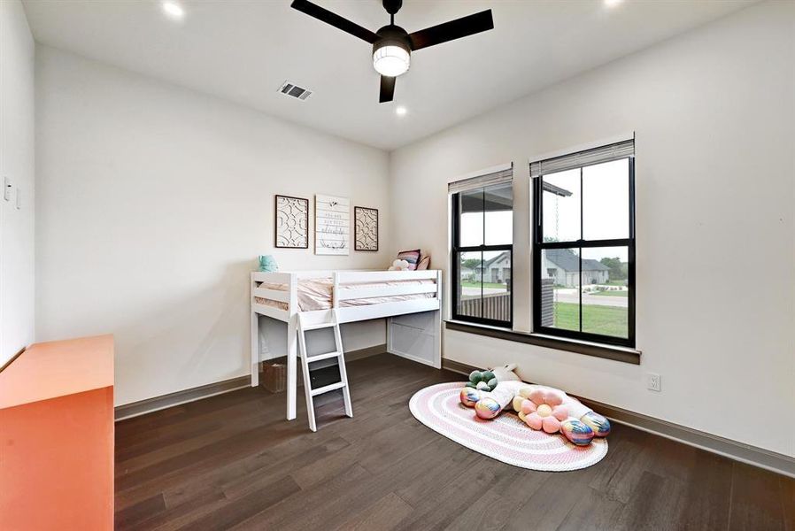 Bedroom featuring dark wood-type flooring, recessed lighting, and ceiling fan