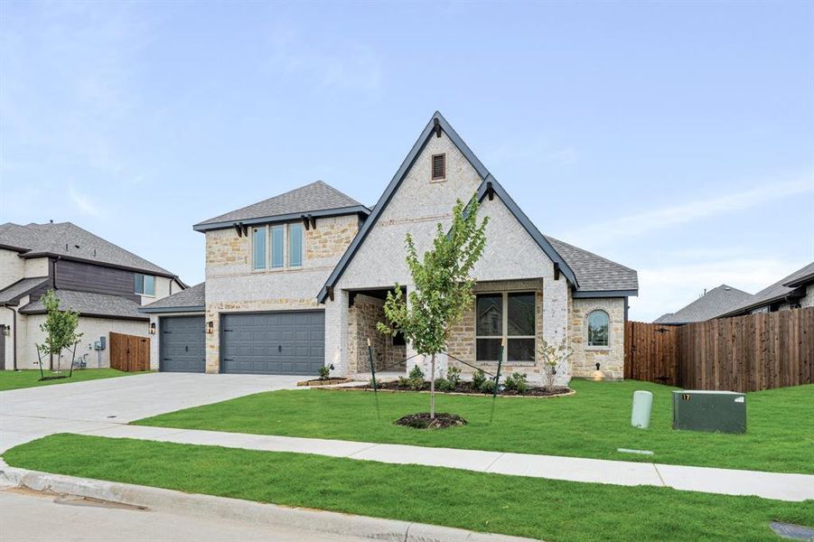 Front exterior of a new home in Hampton Park, Glenn Heights, TX, highlighting curb appeal (Image 23). Front exterior of a new home in Hampton Park, Glenn Heights, TX, highlighting curb appeal (Image 23).