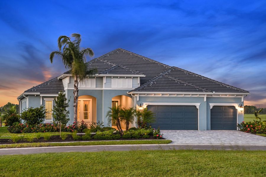 Representative exterior photo of a completed home built from the Kiawah 2 by Neal Communities in Grand Park, Sarasota, FL (Image 15).