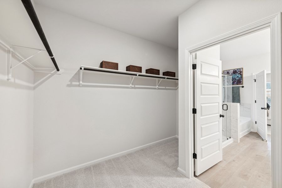 The Princeton II- Primary Bath Walk-In Closet. Staged model home shown for illustration only; actual features, colors, and upgrades may vary. The Princeton II- Primary Bath Walk-In Closet. Staged model home shown for illustration only; actual features, colors, and upgrades may vary.