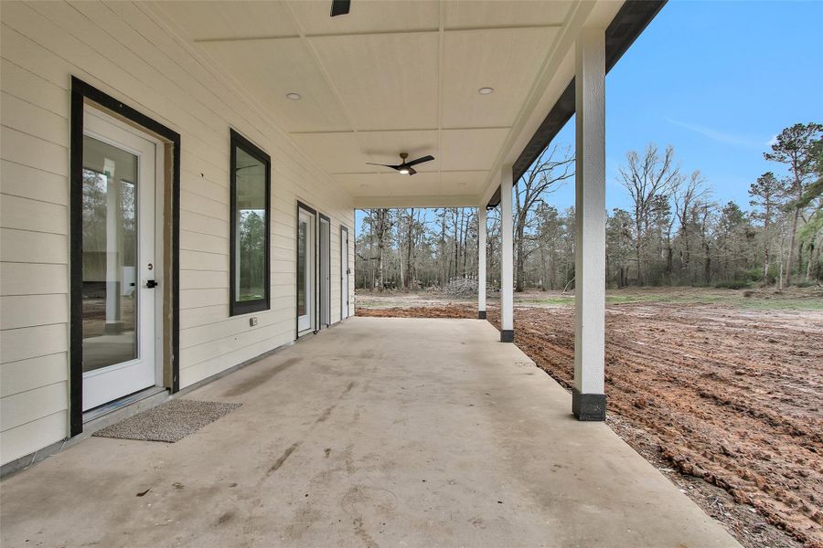 The perfect back porch to go with outdoor fun featuring 1/2 bath and plenty of space for outdoor kitchen and furniture. The perfect back porch to go with outdoor fun featuring 1/2 bath and plenty of space for outdoor kitchen and furniture.