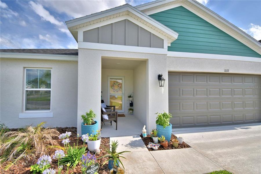 Exterior details and patio area of a home in Harmony at Lake Eloise, Winter Haven (Image 30).